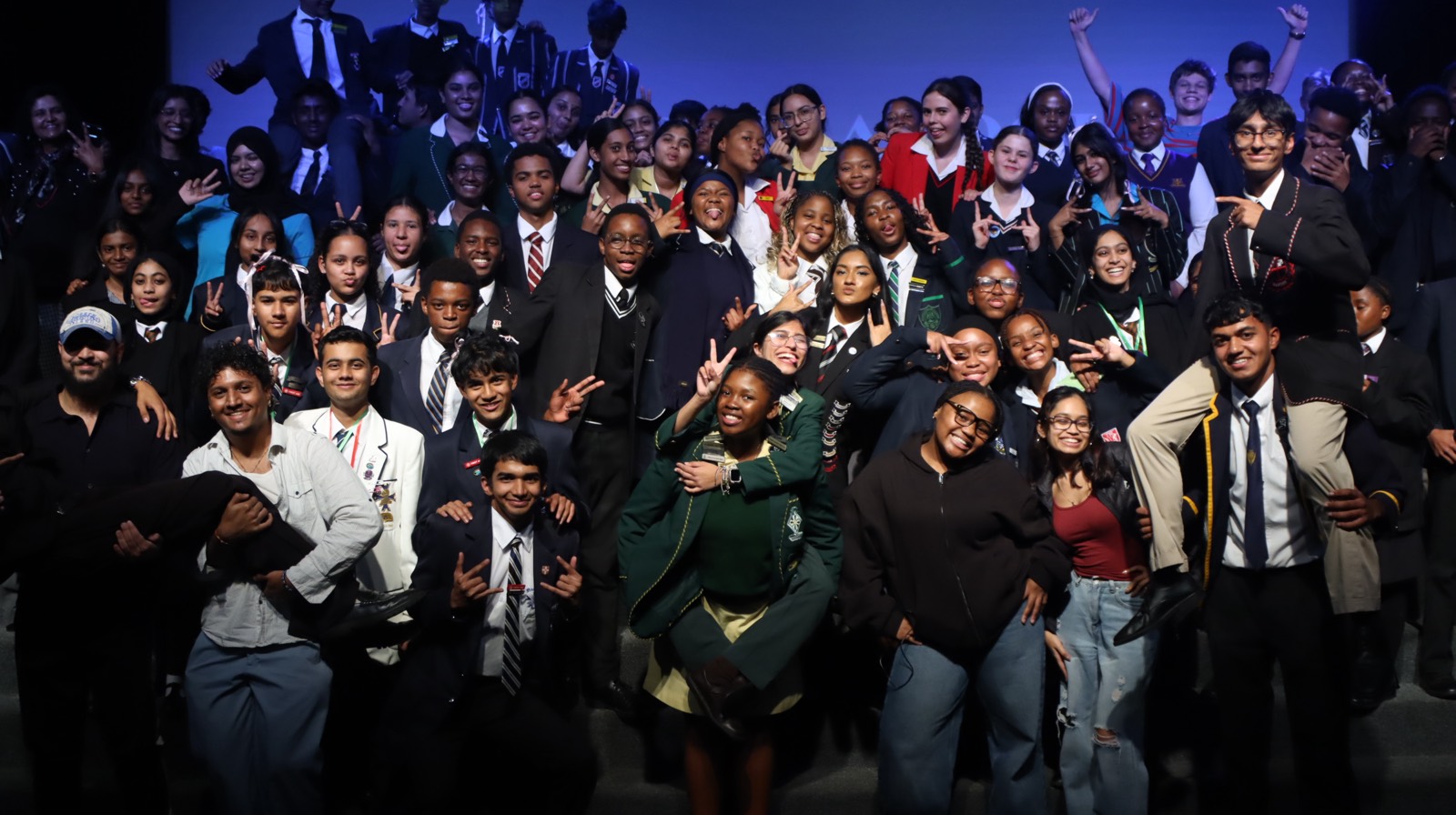 Speakers gathered on stage at an Arché Africa tournament